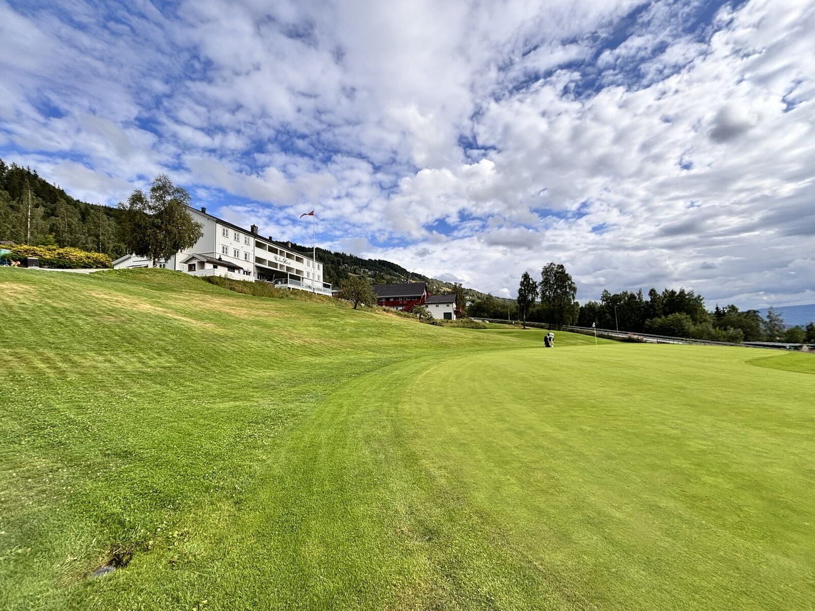 Green på golfbanen en sommerdag